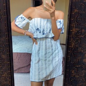 White dress with blue design